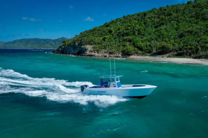 a small boat in a body of water