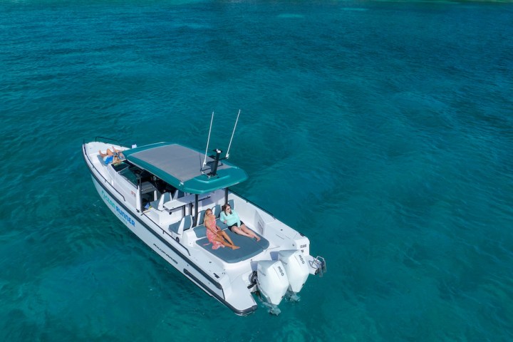 a small boat in a large body of water