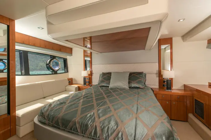 a bedroom with a large bed in a room