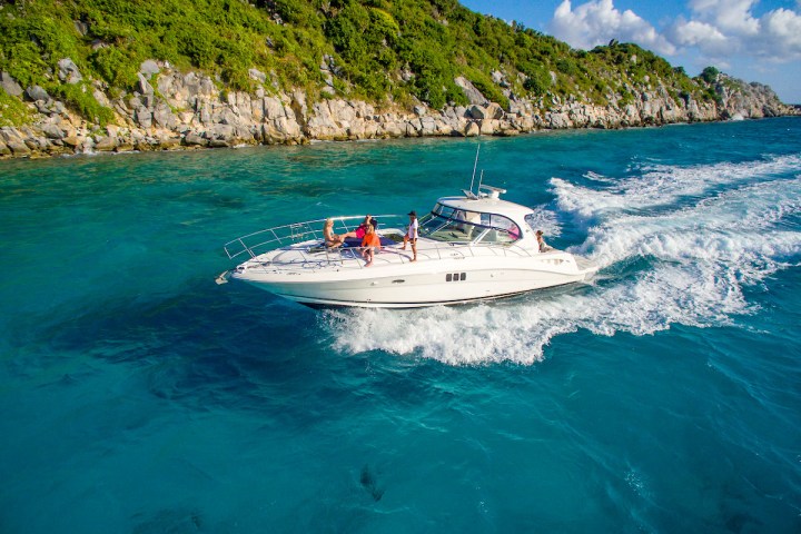 a small boat in a body of water