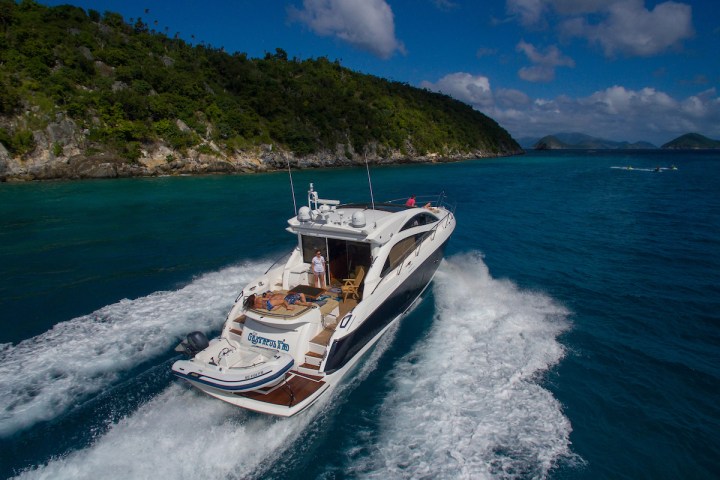 a small boat in a body of water