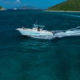 a small boat in a body of water