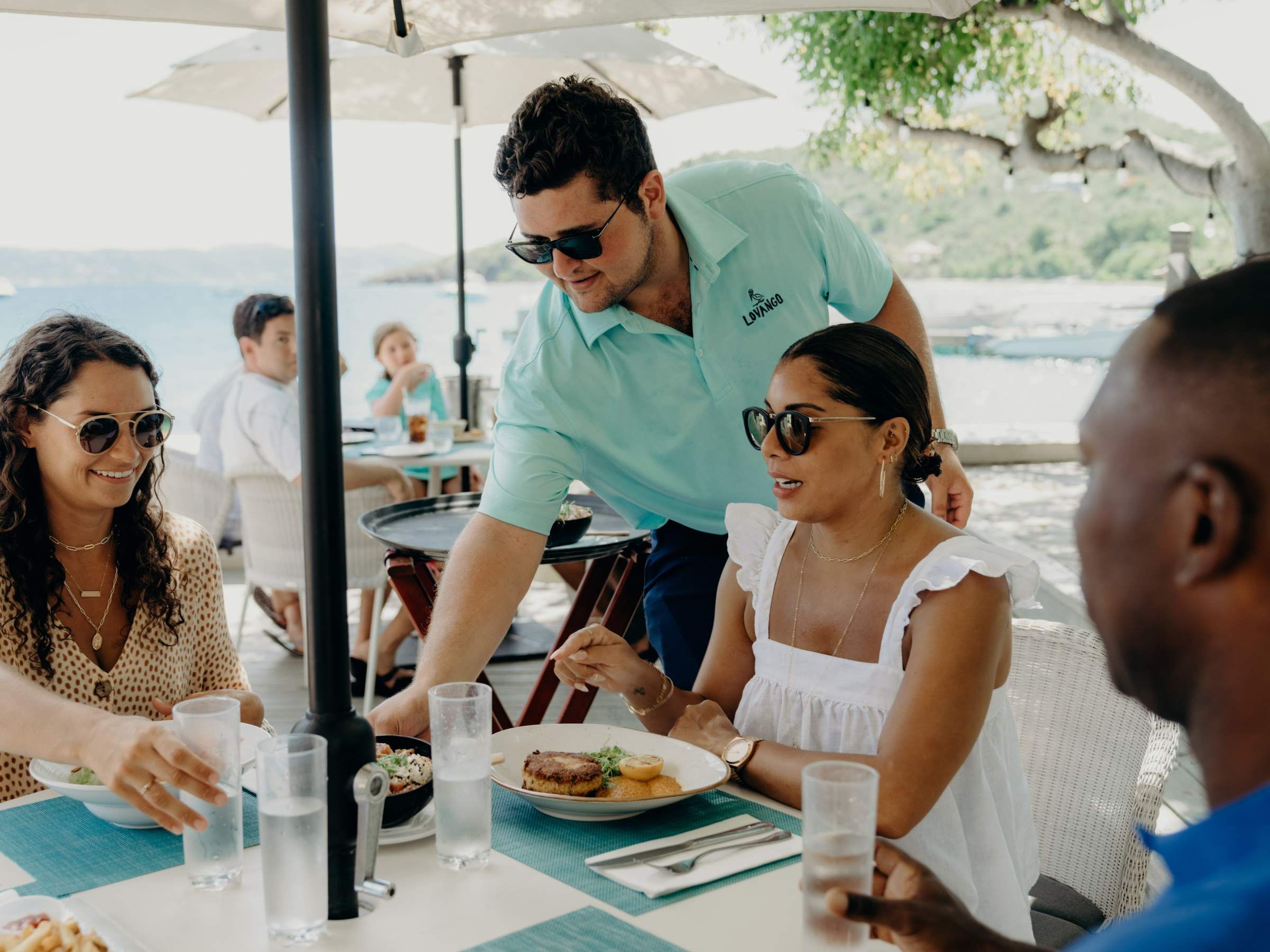 a group of people sitting at a table